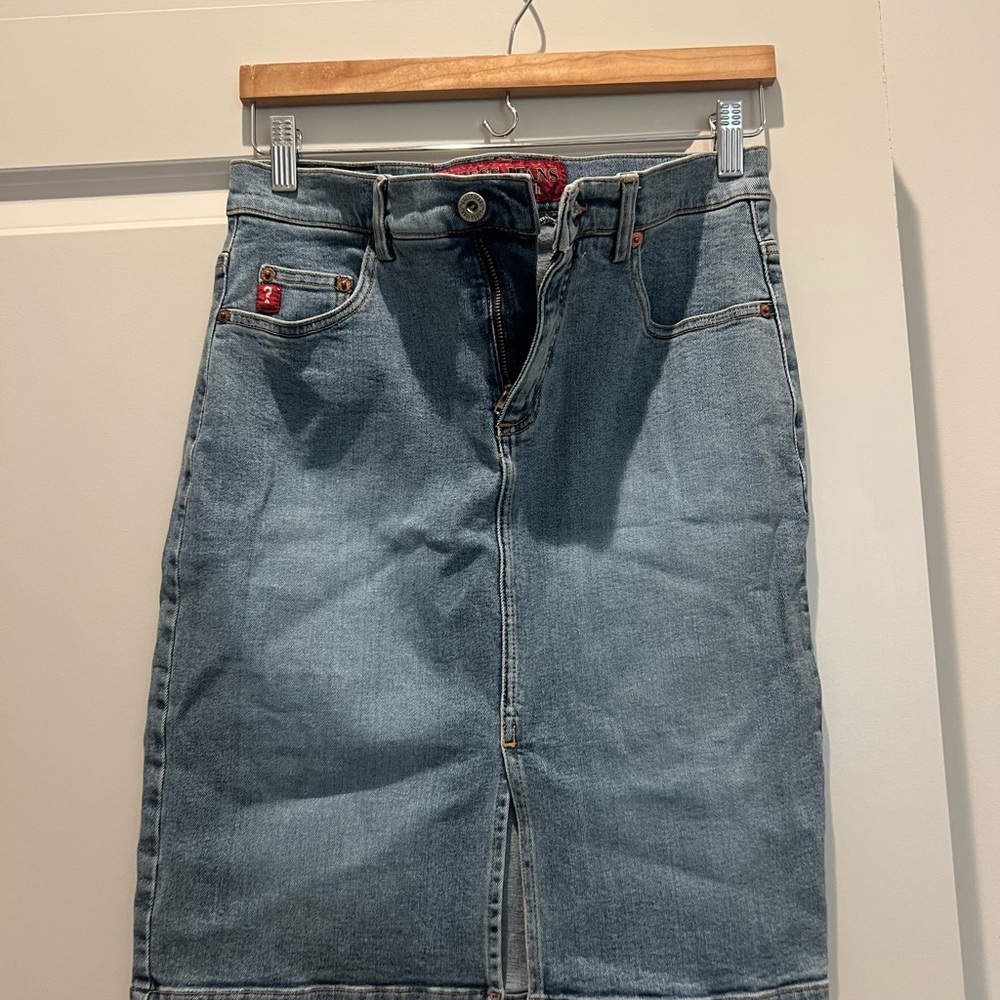 Guess Light Blue Denim Jeans with Red Logo Patch
